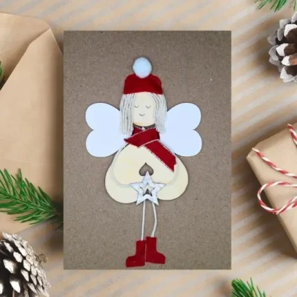 Adorable Family Festive Greeting Card with Angel girl, made of wood on brown paper, from the UK.