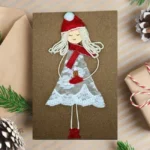Beautiful Homemade Christmas Card with showgirl made of white lace.