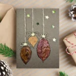 Best Handmae Merry Christmas card for Someone Special made of three dry leaves and paper stars.
