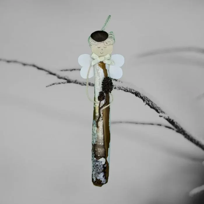 Handcrafted Razor Shell Blessing ornament made of Razor Shell. Ornament has been made in the UK.