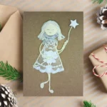 Handmade Christmas Card for Grandparents with a smiling girl made from lace fabric holding a star.