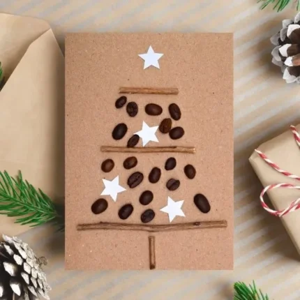 Handmade Personalised Christmas Tree Card made of coffee beans and wooden sticks.