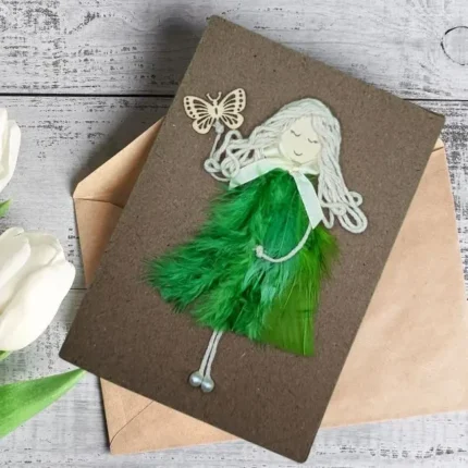 Perfect Birthday Wishes Card for Your Wife made of green feathers and wooden butterfly.