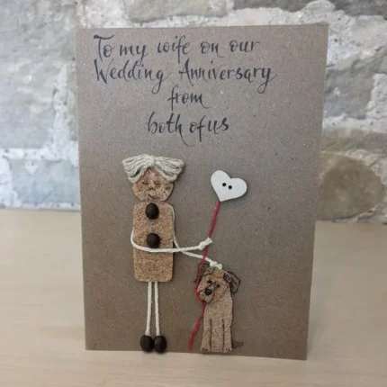 A handmade wedding anniversary card for my wife - from both of us. The card is on the table.