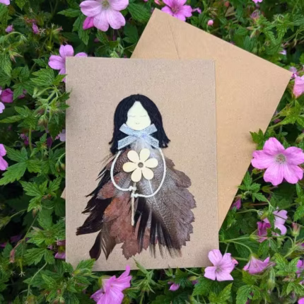 Personalised handmade birthday card for her depicting a girl wearing a feather headdress and with envelope perfect for celebrating her special day.